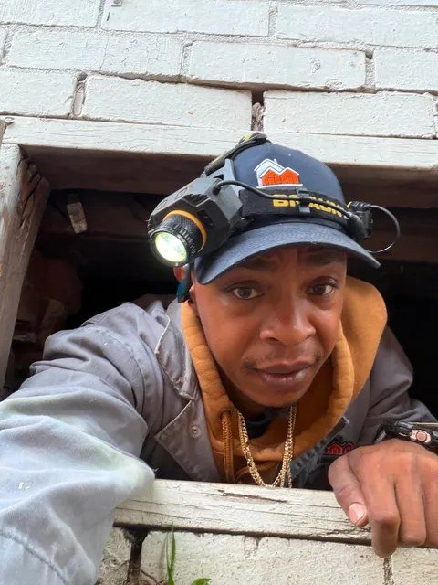 Elite Choice inspecting the crawl space for maintenance concerns